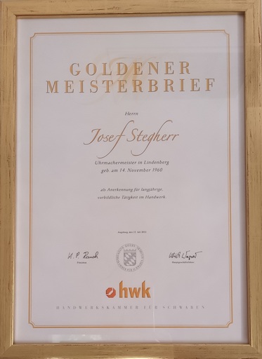 Goldener Meisterbrief - Herrn Josef Stegherr,
                  Uhrmachermeister in Lindenberg, geb. am 14. November 1960
                  als Anerkennung für langjährige,
                  vorbildliche Tätigkeit im Handwerk